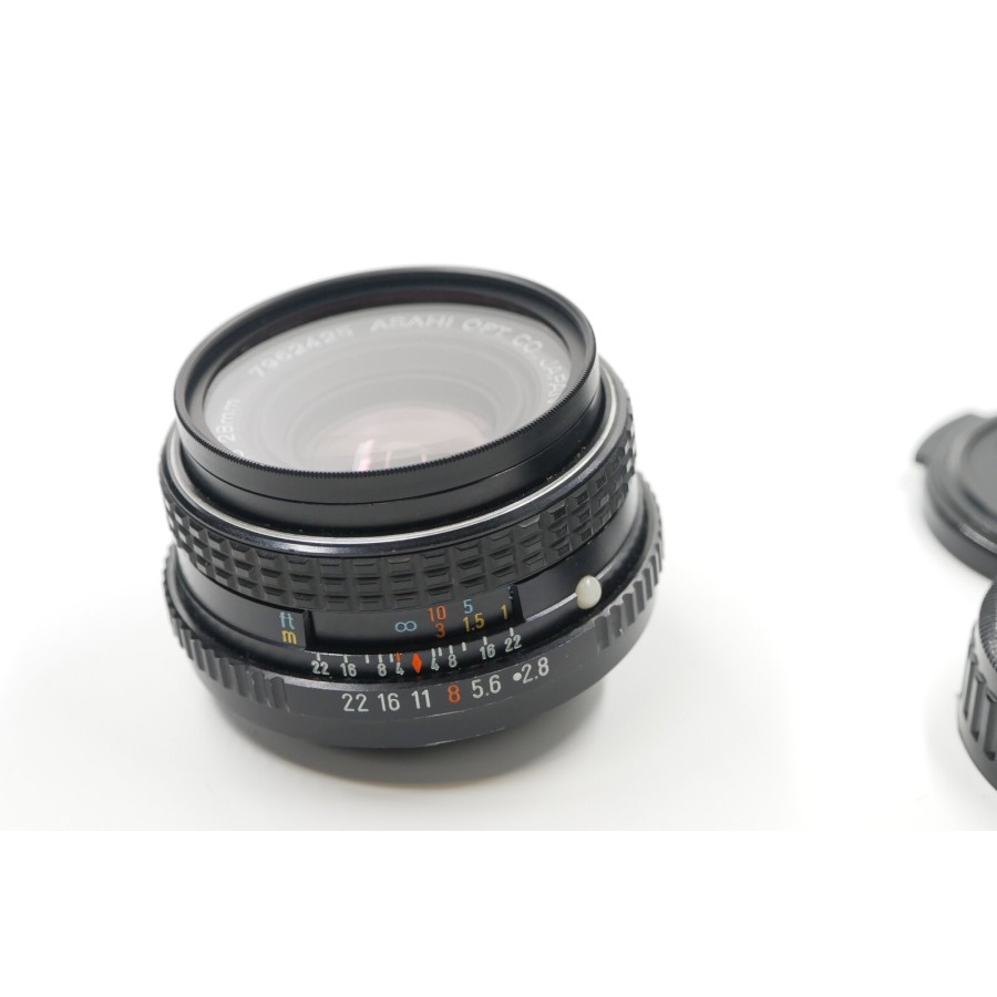 PENTAX SMC M 28mm f/2.8 Weitwinkelobjektiv mit Original Front- und Rückdeckel PENTAX SMC M 28mm f/2.8 Weitwinkelobjektiv mit Original Front- und Rückdeckel