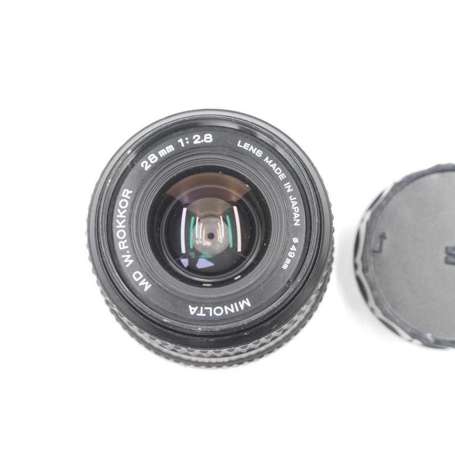 MINOLTA MD W.Rokkor 28mm f/2.8 Weitwinkelobjektiv mit Front- und Rückdeckel MINOLTA MD W.Rokkor 28mm f/2.8 Weitwinkelobjektiv mit Front- und Rückdeckel